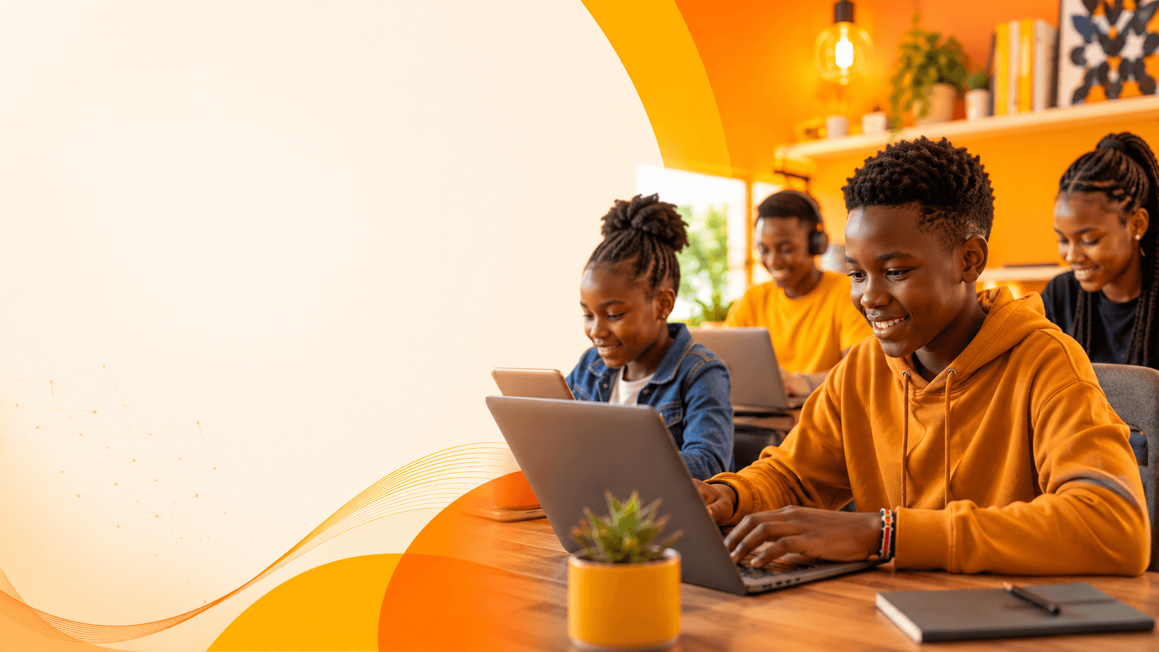 African children and teenagers learning technology skills together on laptops
